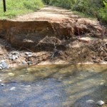 A pipe culvert on County Road 515 was blown out leaving a split in the road. The split was caused by heavy rains on April 7.