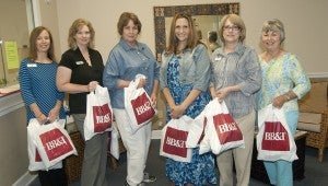 BB&T representatives prepared goodie bags for Care Net clients facing unplanned pregnancies. Pictured (from left to right) are Dana Calfee and Sherry Daugherty with BB&T Bank, and Ann Braswell, Kimberly Fenske, Susan Scott and Shirley McAfee with Care Net.