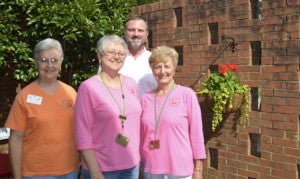 Chilton County Master Gardeners helped renovate the outdoor patio area at the Chilton-Clanton Public Library. Master Gardeners Lanell Baker, Pat Farmer and Audrey Giles stand with Chilton-Clanton Public Library Director Kelly Easterling near the area the group renovated. Not pictured were Harriett Jackson, Lamar Giles and Jerry Farmer, who also helped with the renovations. 