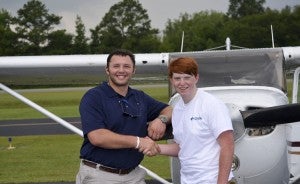Evans with his flight instructor Robert Glenn. 