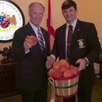 Special gift: C.J. Robinson (right) with the Chilton County Republican Party presented a basket of Chilton County peaches to Alabama Gov. Robert Bentley.