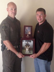Blackmon (right) helped put together a special memorial for a state canine drug dog that passed away from old age. 