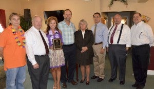 Kimberly Headley, Chilton County Probate Judge Bobby Martin, Gardens Administrator Vickie Moseley, Justin Thomas, Chilton County District Judge Rhonda Hardesty, Chilton County Circuit Court Clerk Glenn McGriff, state Rep. Jimmy Martin and Scott Lawrenson with Great Oaks Management participate in Hawaiian Day.