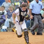 Billingsley catcher Madison Motley chases down a pop up in foul territory as Casey Headley hustles over.