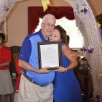 (left to right) Clanton Mayor Billy Joe Driver presented a proclamation to Vickie Moseley with the Gardens of Clanton during a ceremony to begin National Assisted Living week on Monday.