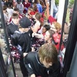 Maplesville players walk through a tunnel of students on their way to the bus.